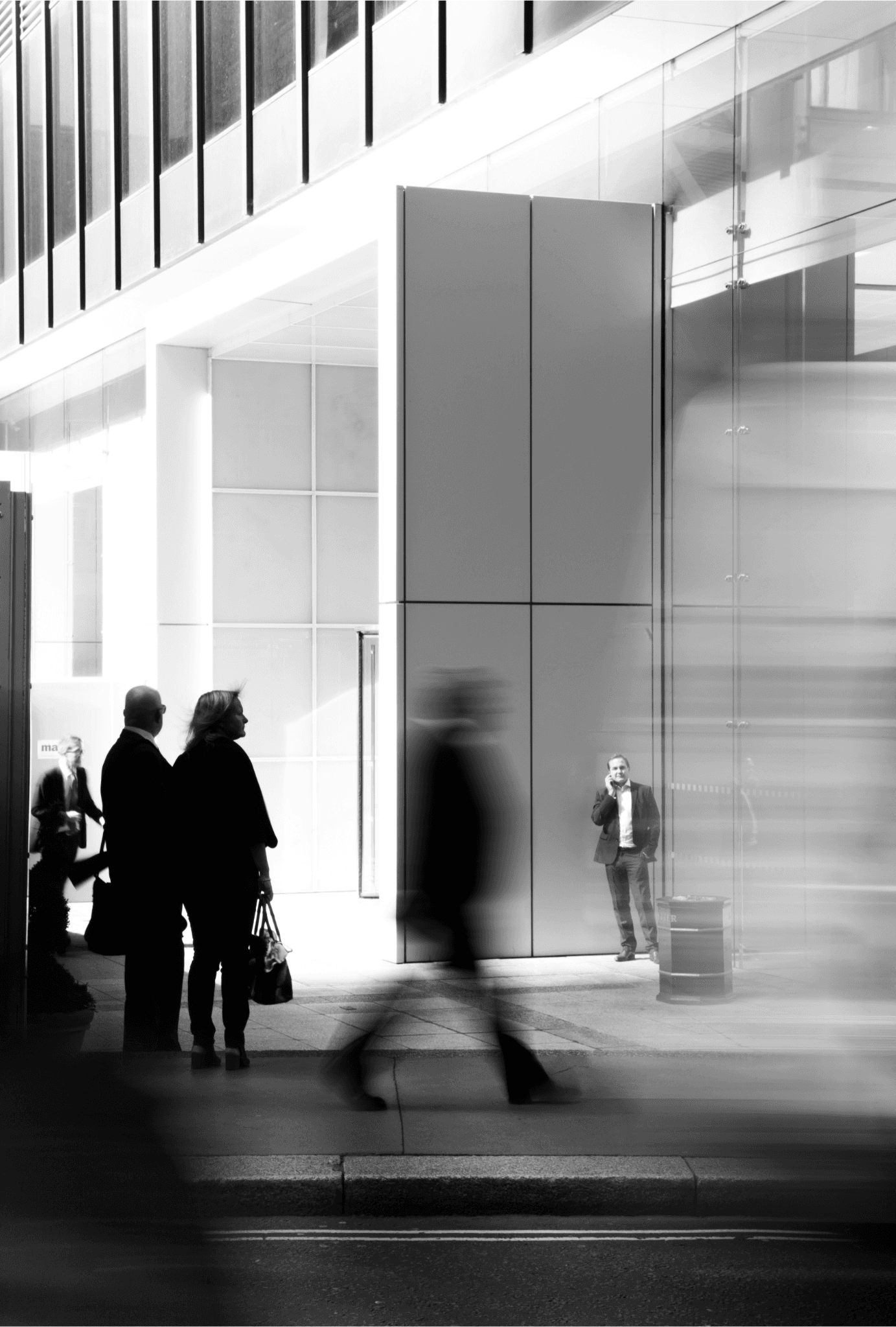 Business district lobby with people moving through the space